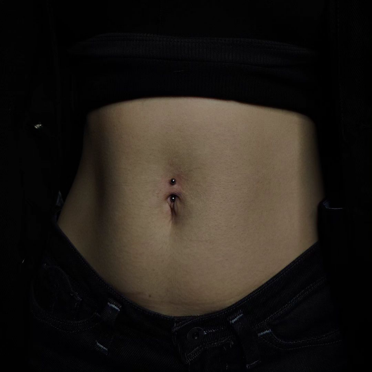 1 belly button piercings person with belly piercing