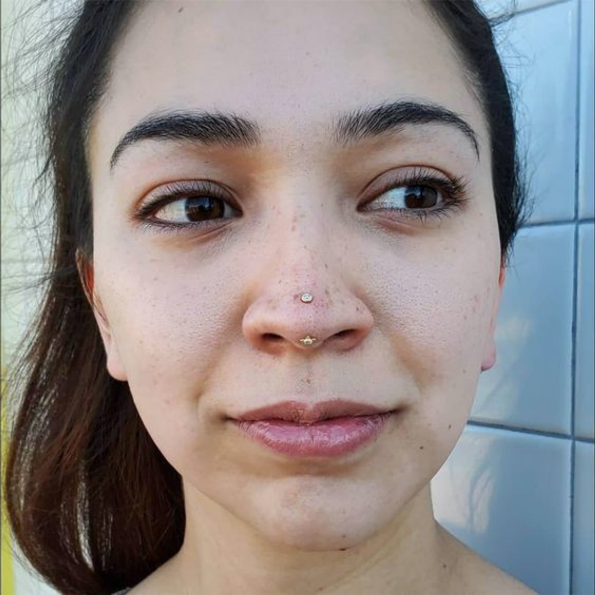 15 woman with rhino piercing on nose