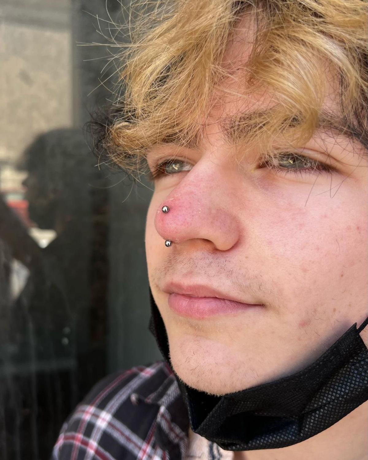 4 piercing on nose with barbell