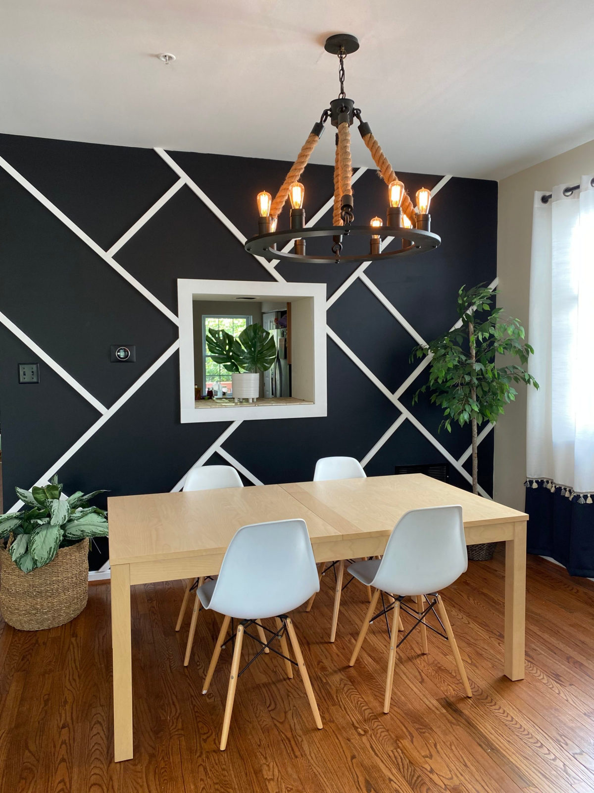 black accent wall dining room