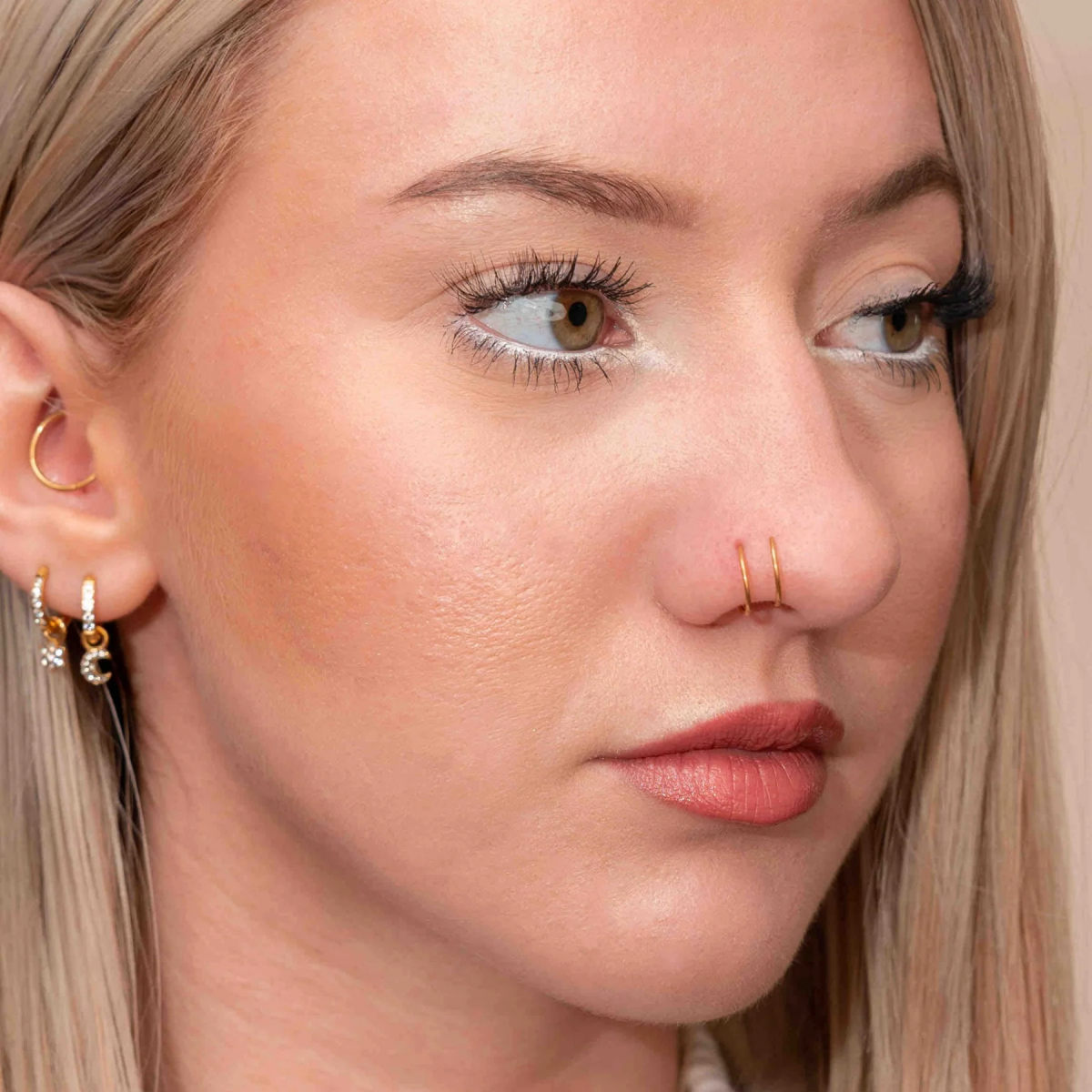double nose piercing one side.jpg