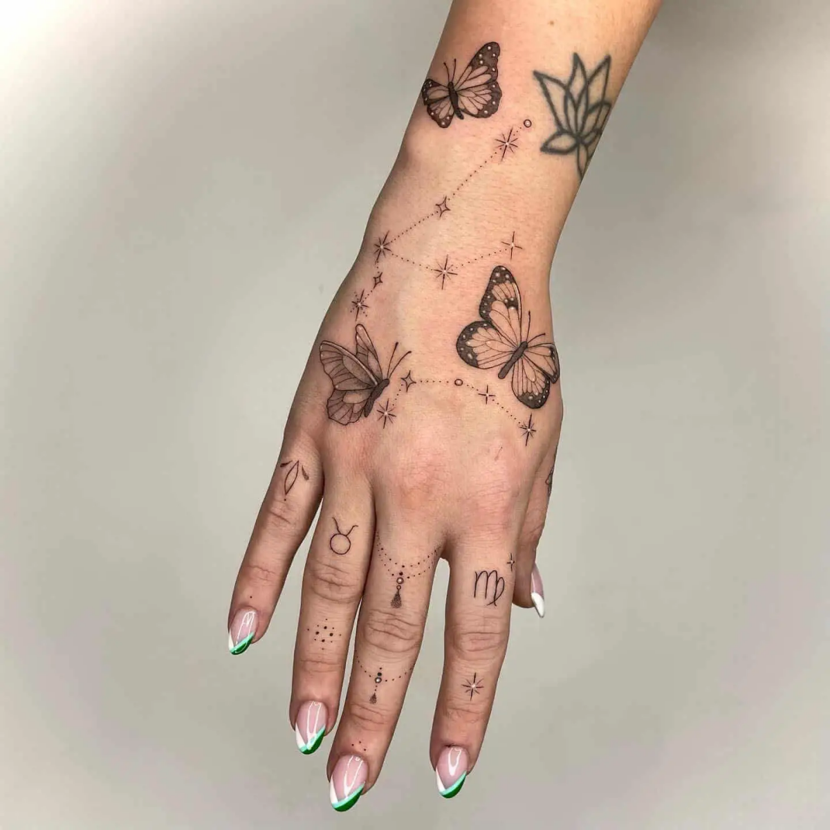 feminine hand tattoos.jpg