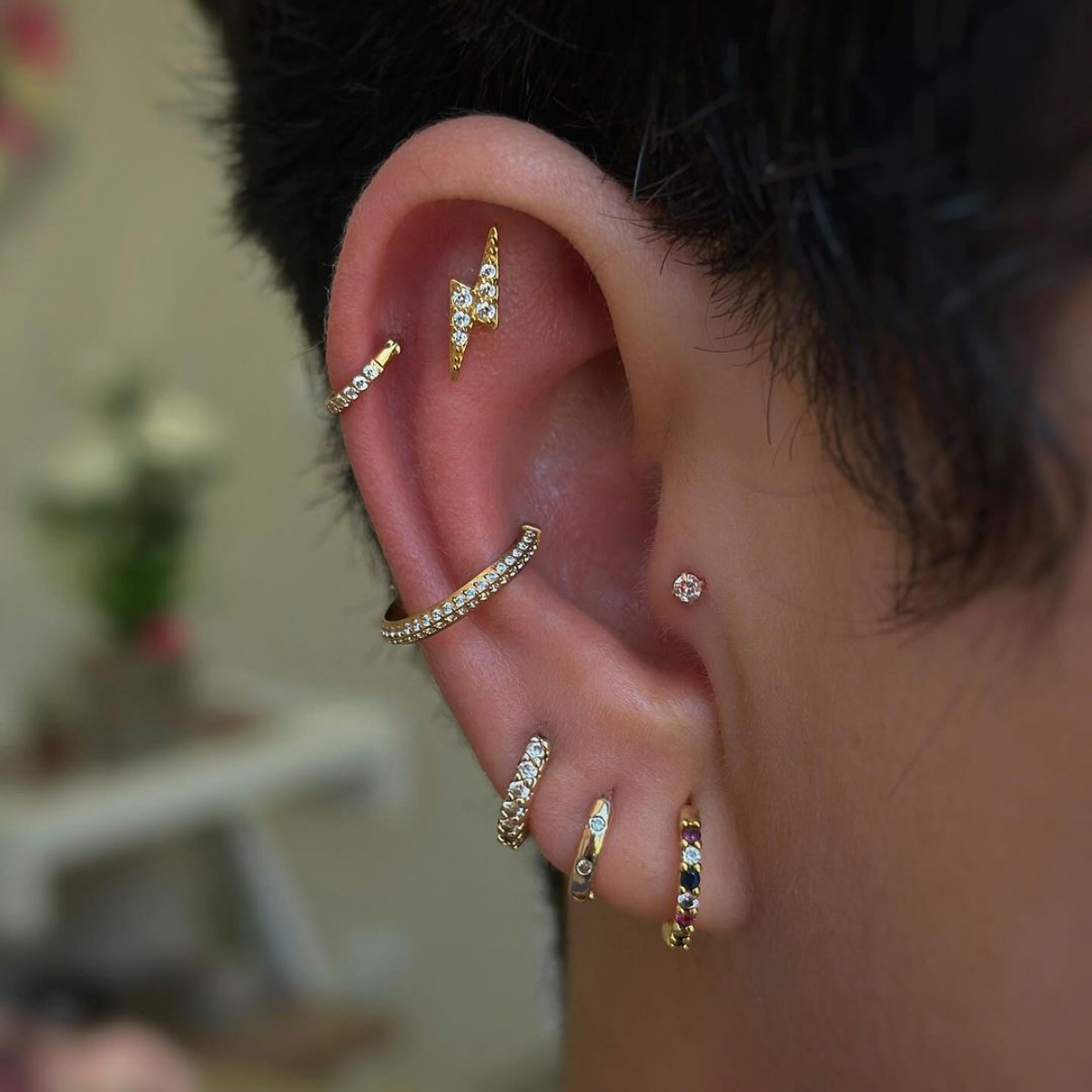 gemed tragus piercing and earring design