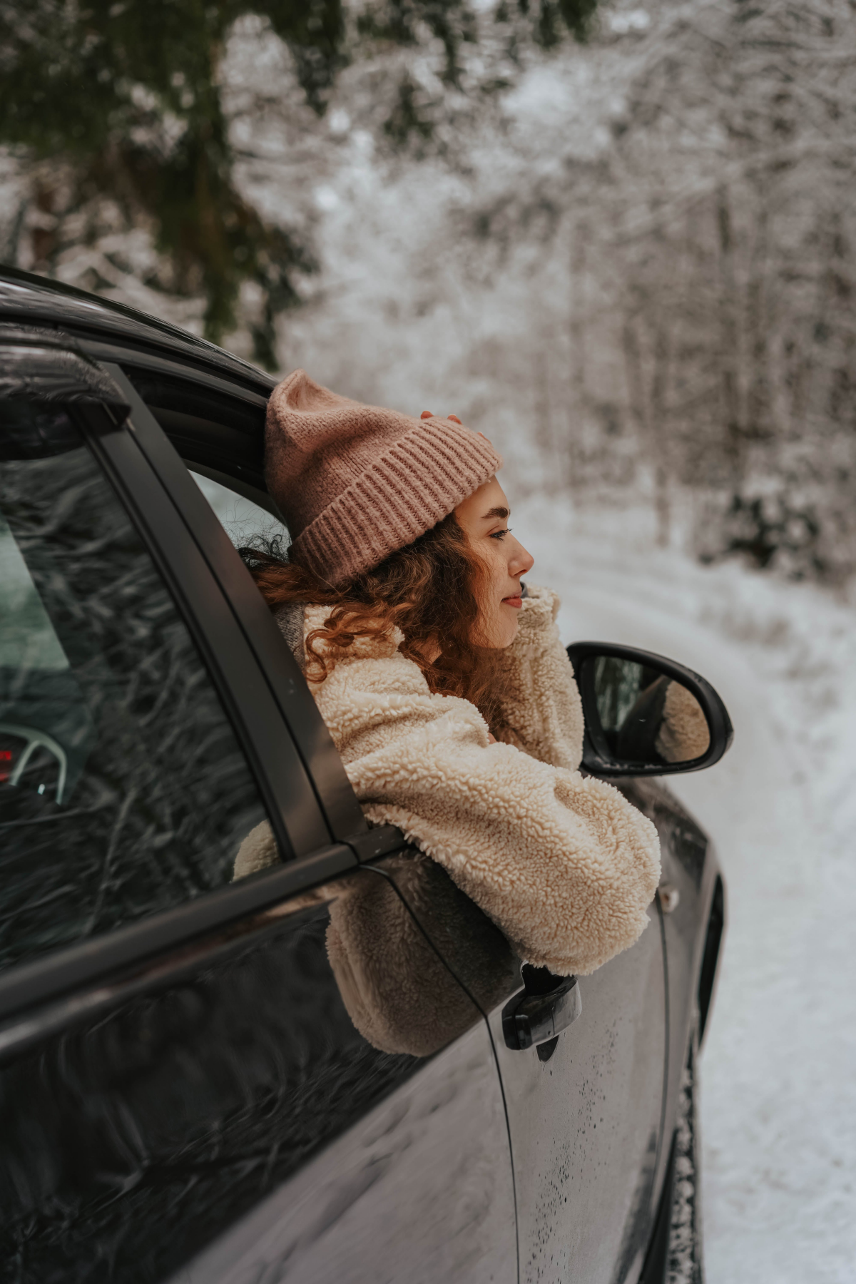 how to winterize your vehicle woman showing out of car