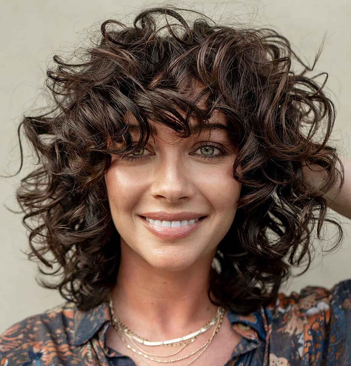 short hair with curly bangs