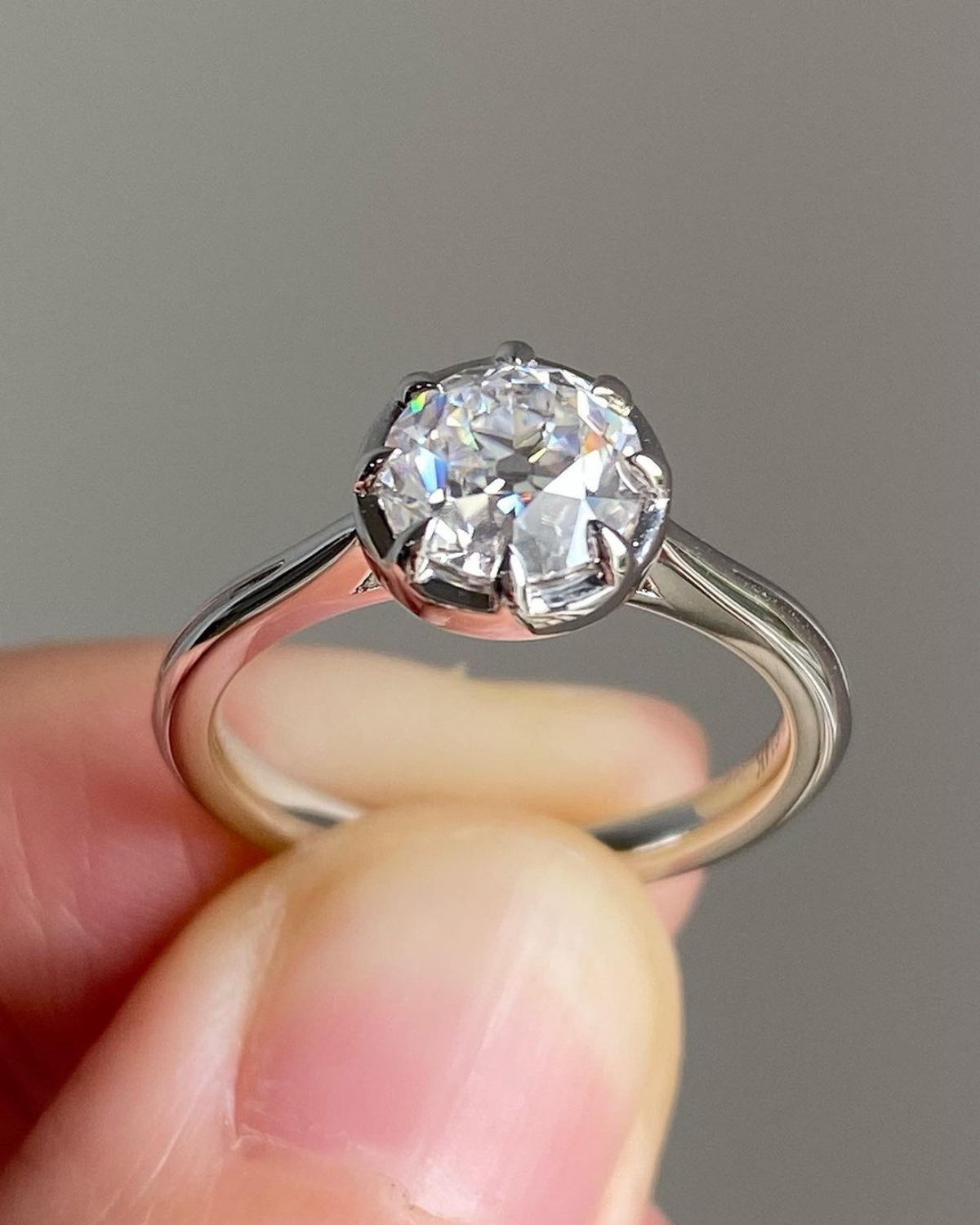 solitaire ring in hand
