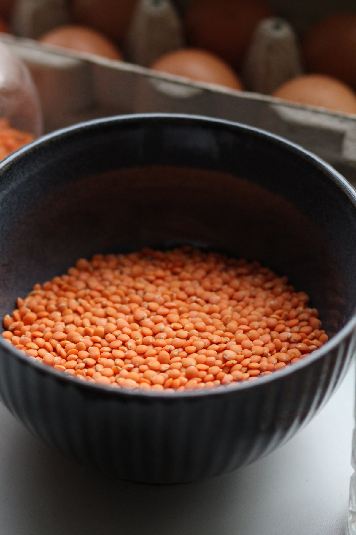uncooked red lentils in a bowl