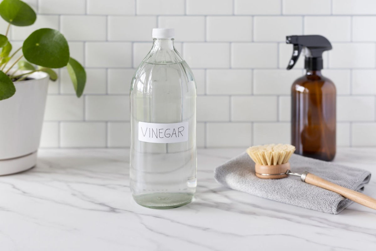 white vinegar in clear bottle