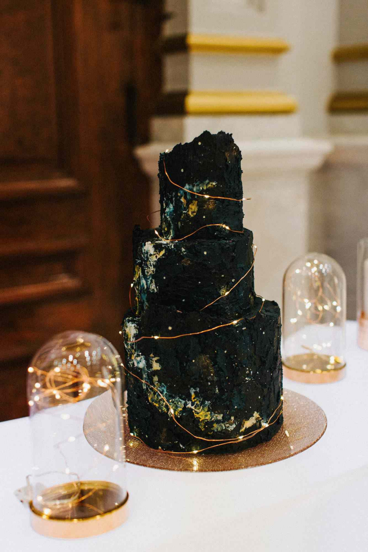 elegant gold and black wedding cake