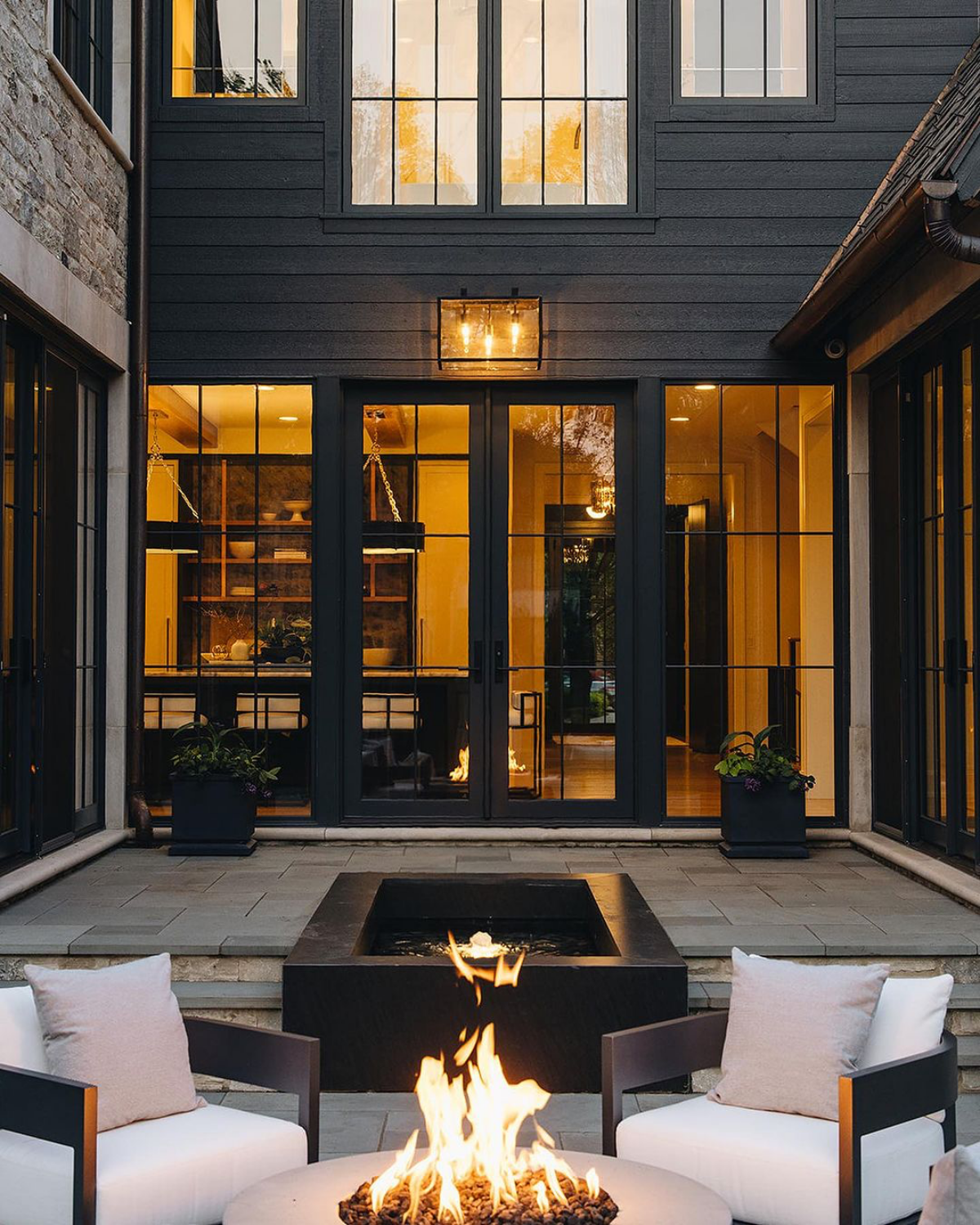 fire pit ideas fire pit with two chairs in front of black house