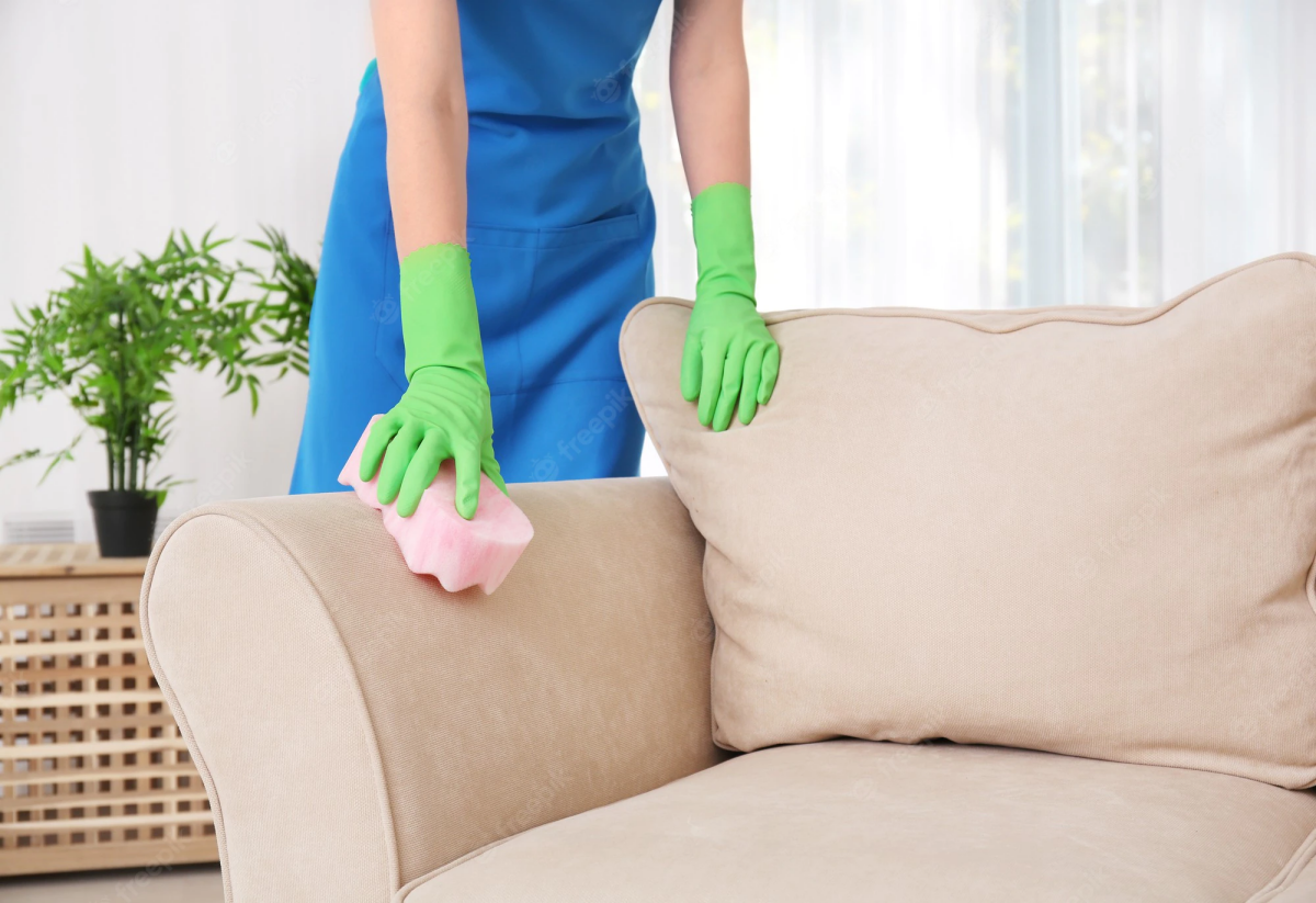 how to clean polyester couch woman cleaning couch