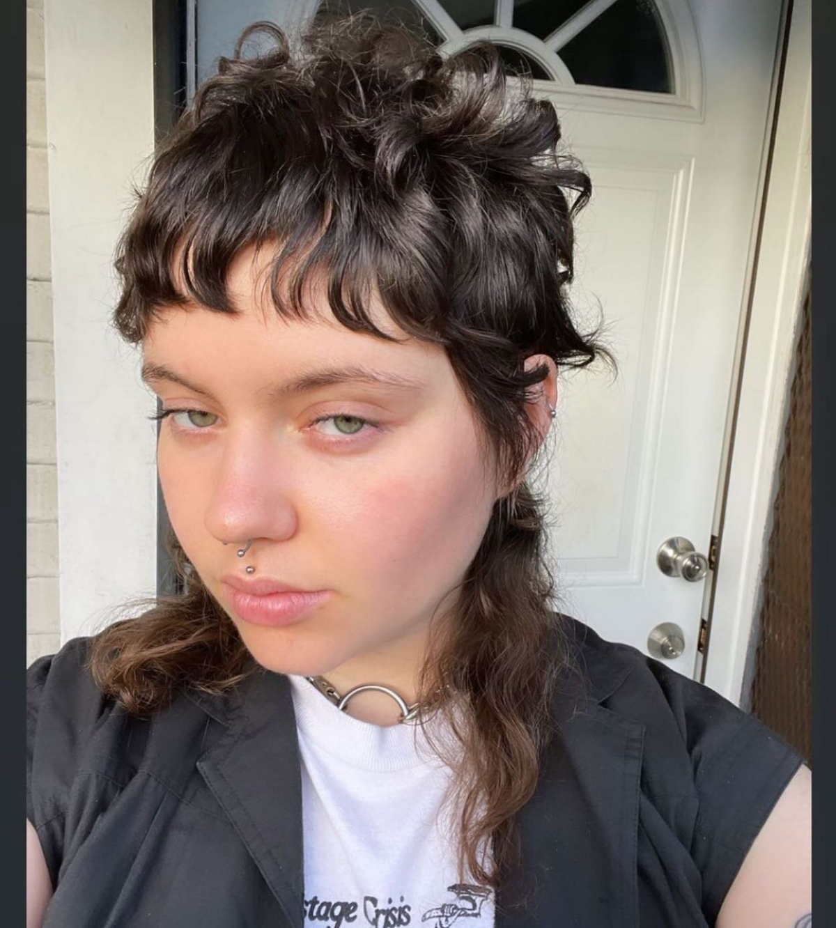 modern curly mullet woman