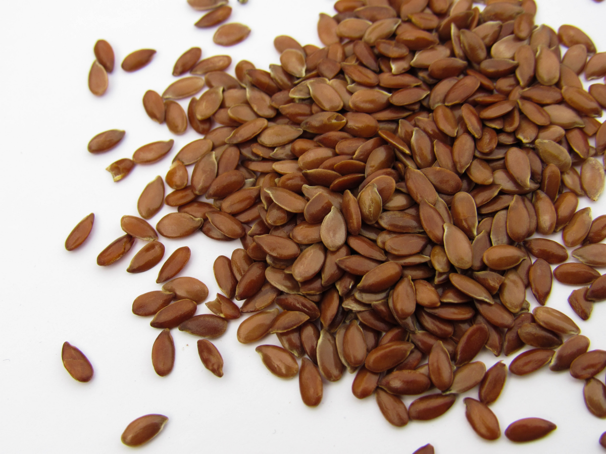 pile of flaxseed on white background