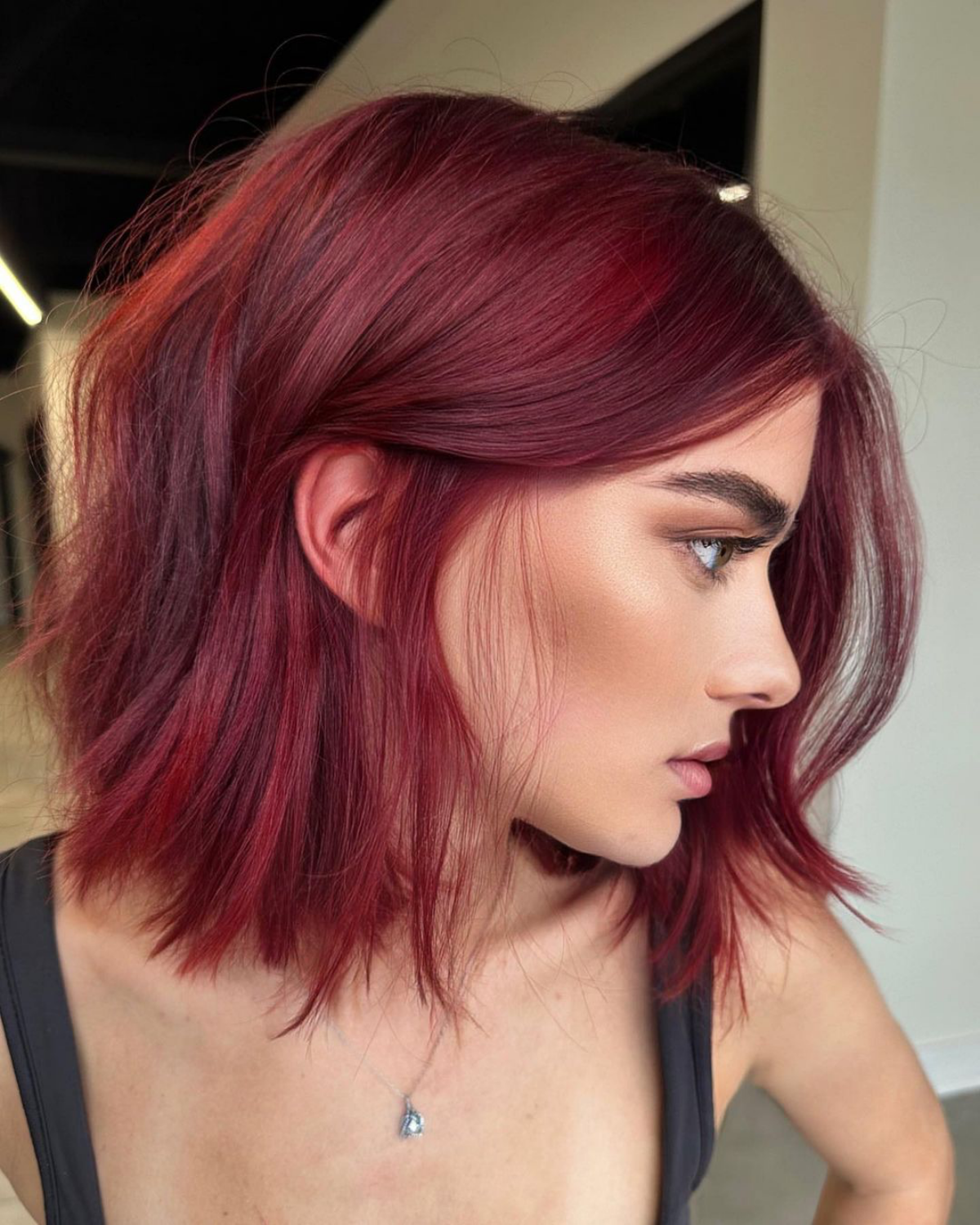 red hair woman with red balayage