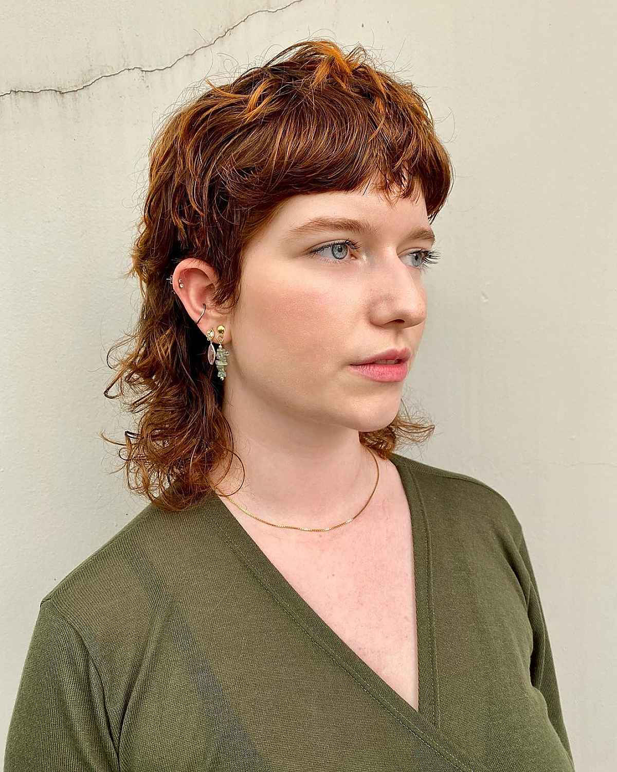 short curly mullet woman