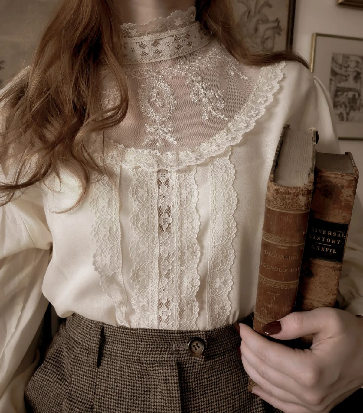white blouse and books
