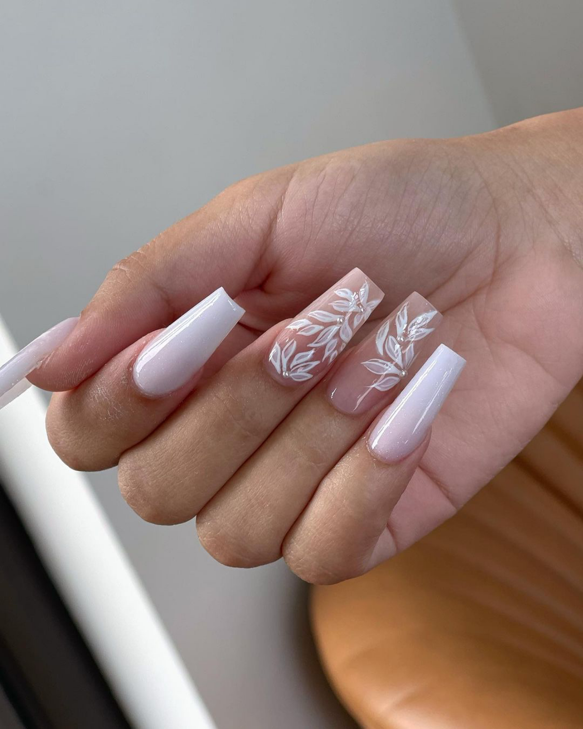 white flowers with white nails
