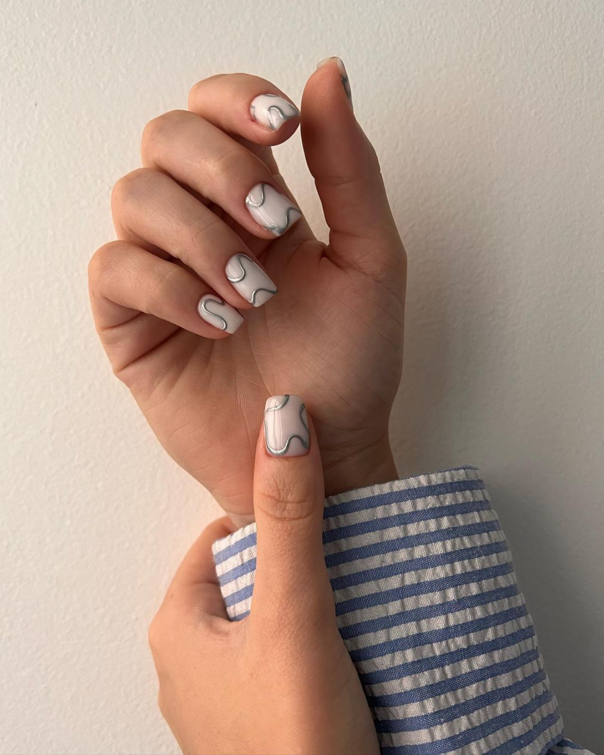white with silver waves nails