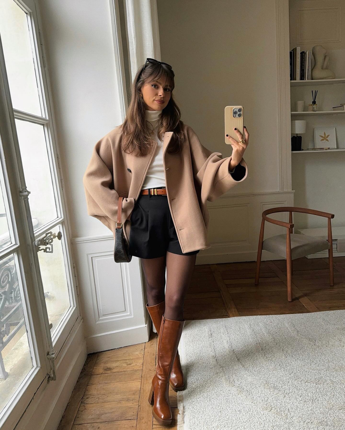 winter date night outfits brown boots and black shorts