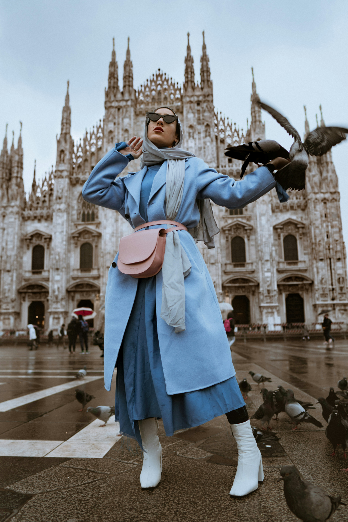 woman in milan with blue coat