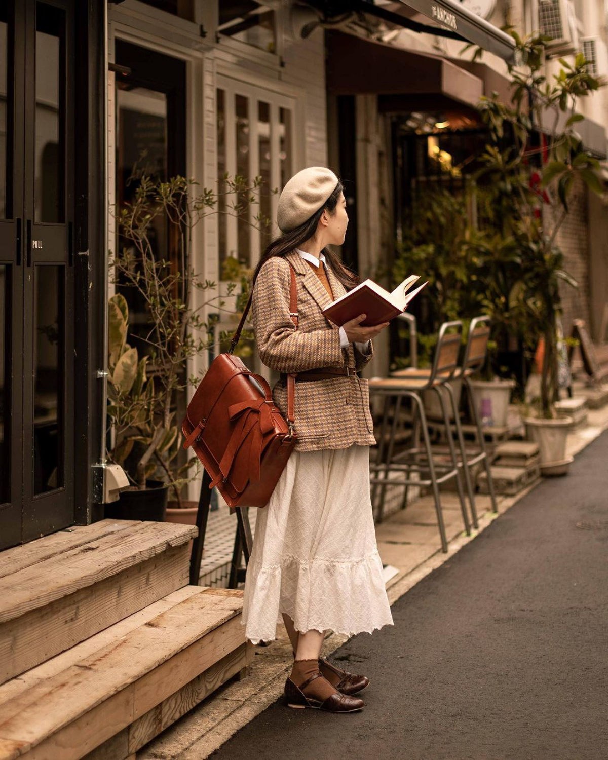 woman reading on the street