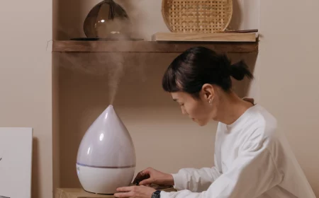 woman turning on humidifier