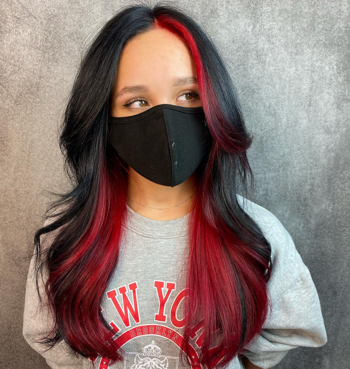 black hair with red highlights on girl