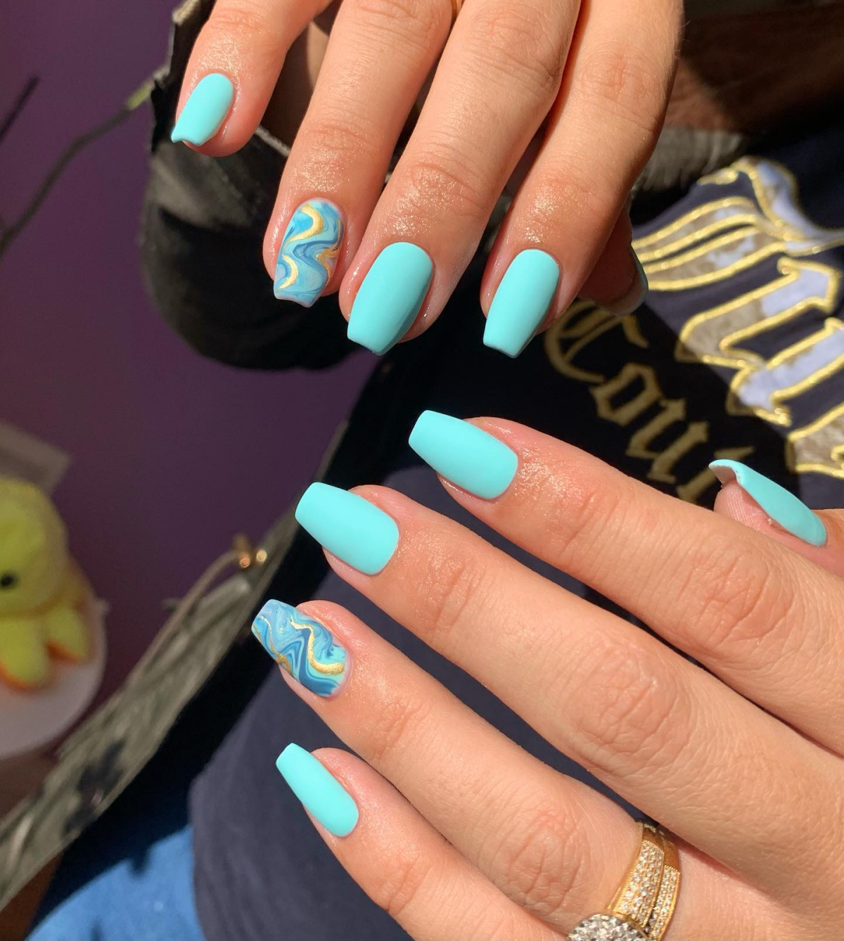 bright blue nails with waves