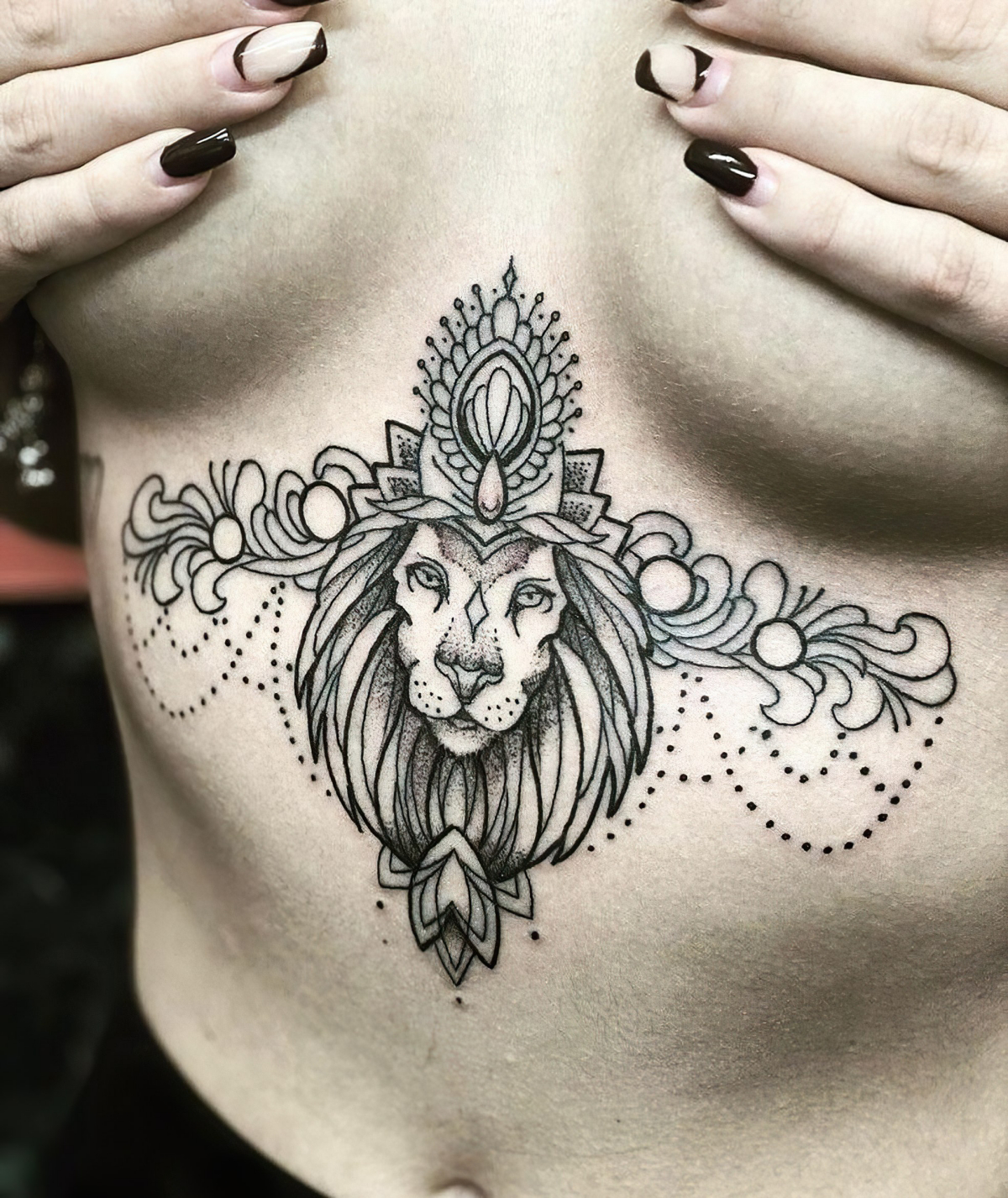 female sternum tattoos lion