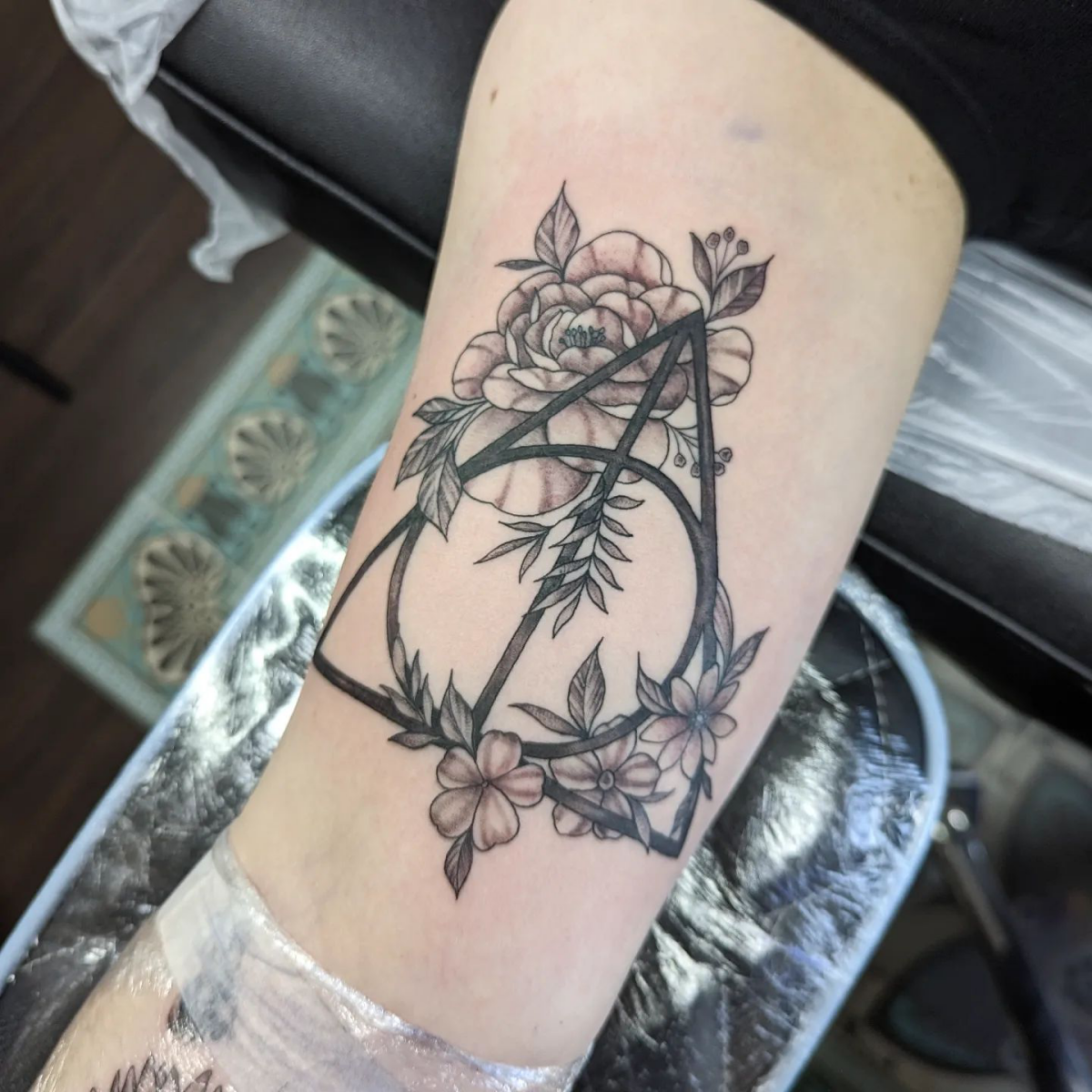 floral deathly hallows tattoo