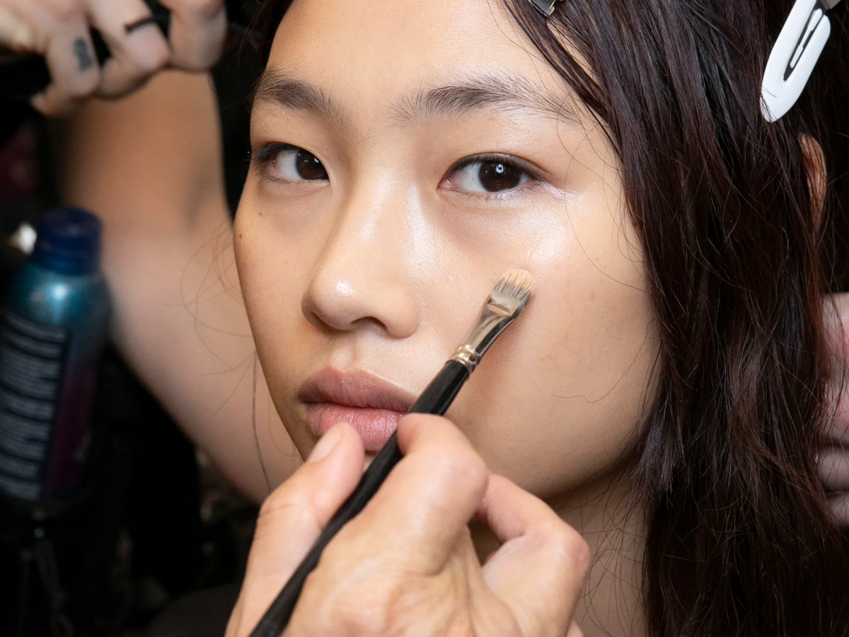 foundation being applied to model backstage