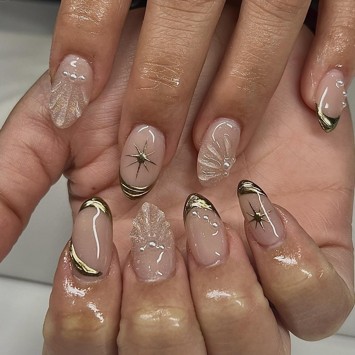 golden and pearl nail accents