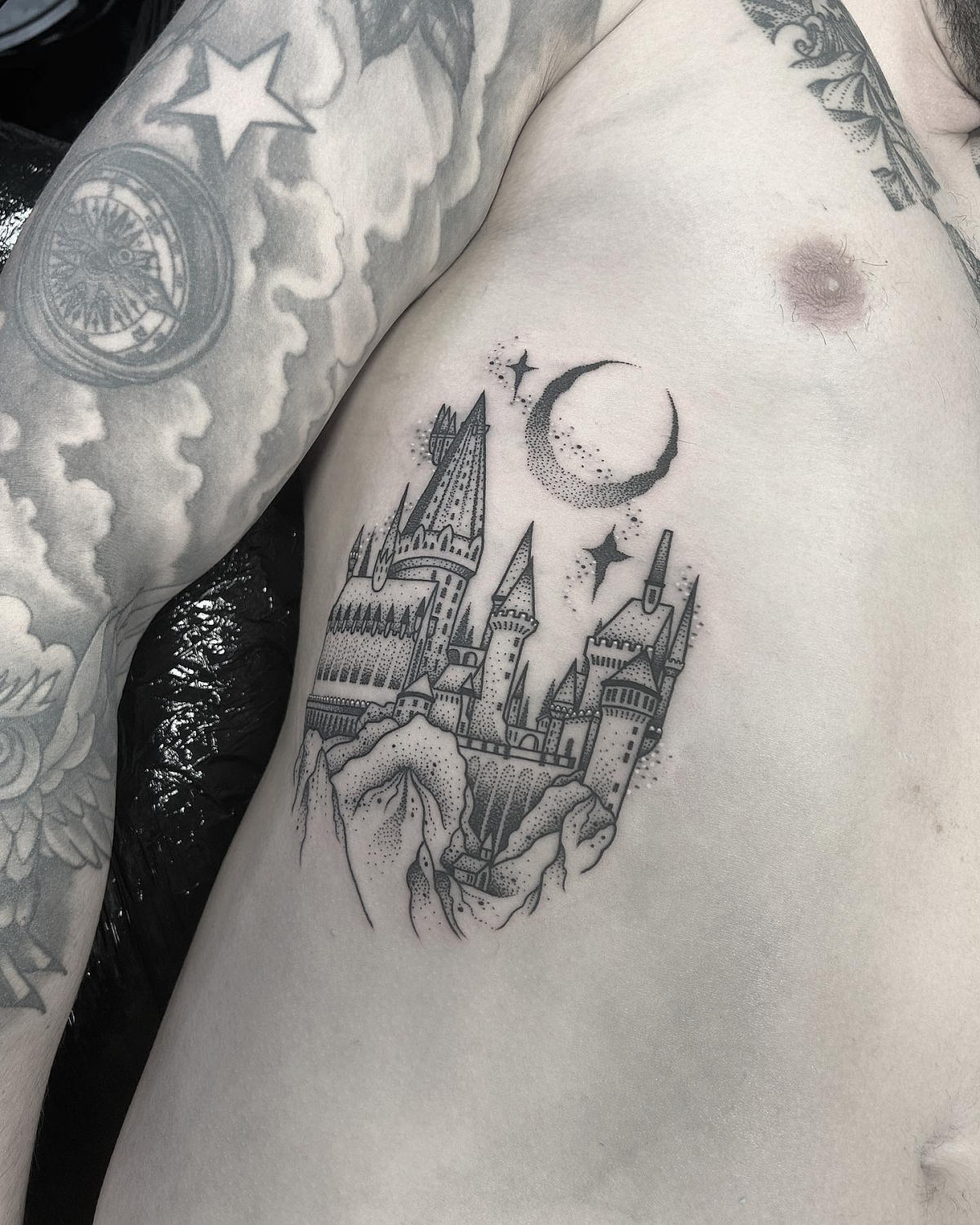 hogwarts tattoo on ribs