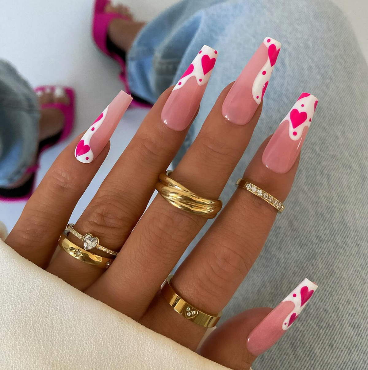 hot pink hearts on pink nails