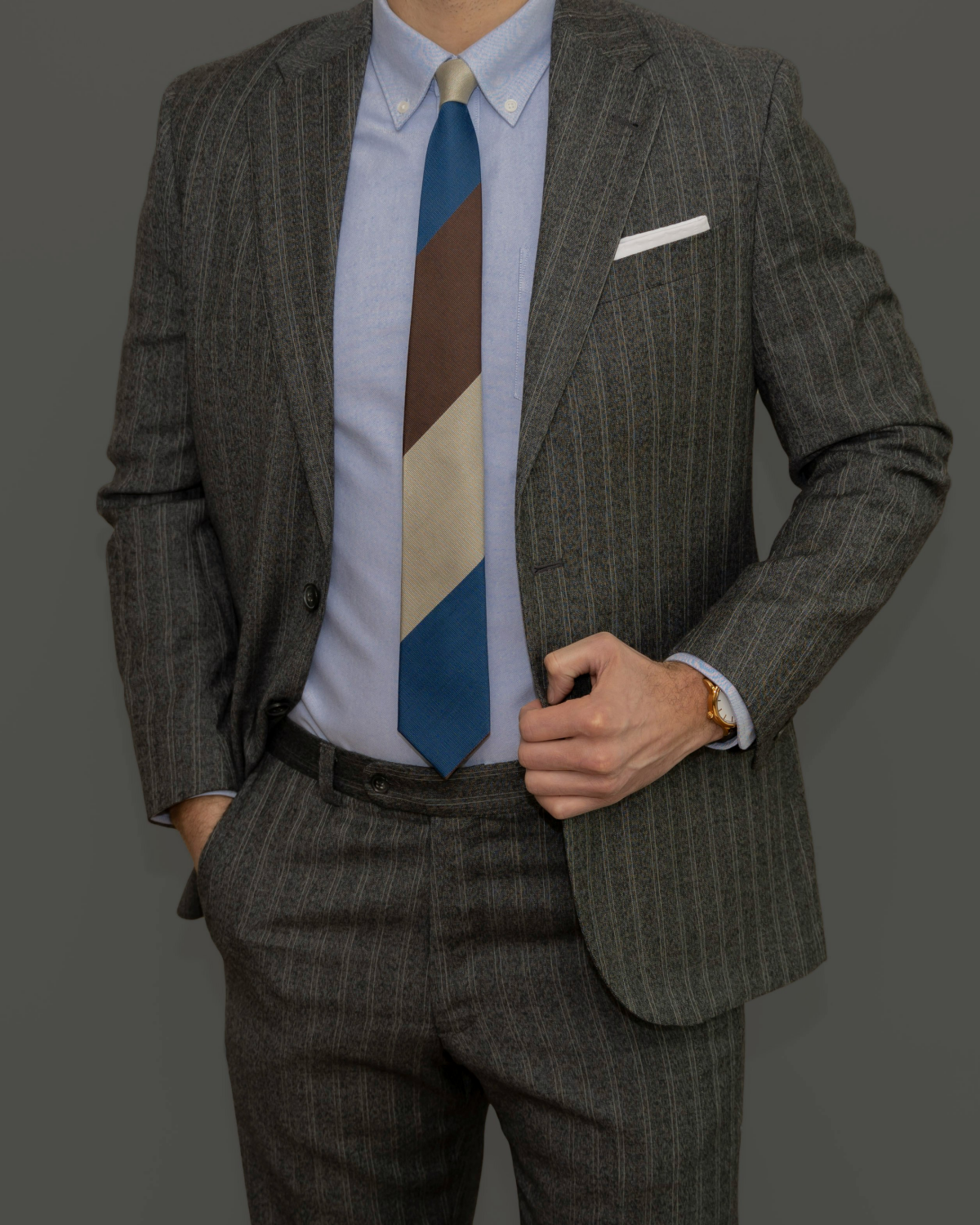 man wearing a gray suit