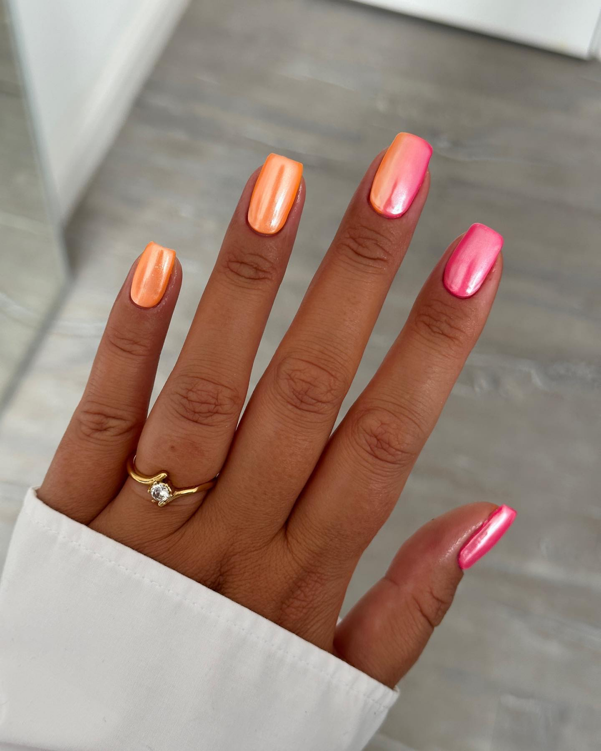 orange chrome nails and pink chrome nails