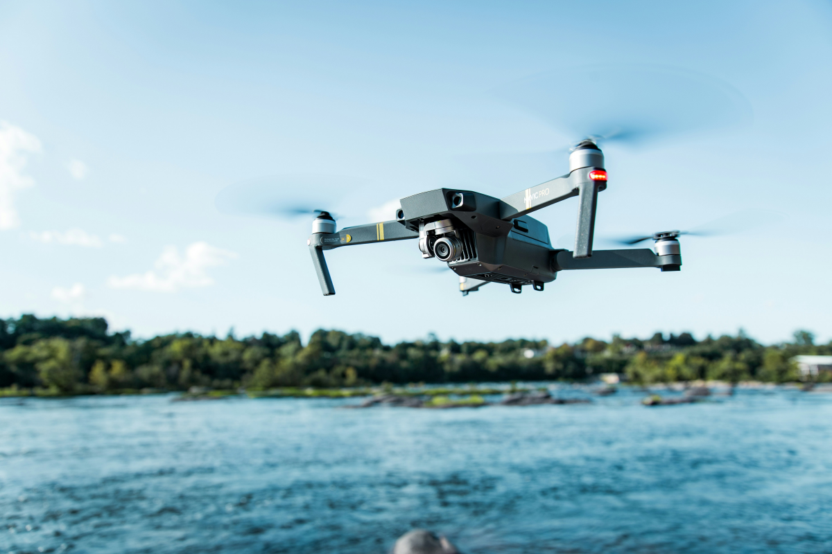 outdoor hobbies drone flying above water