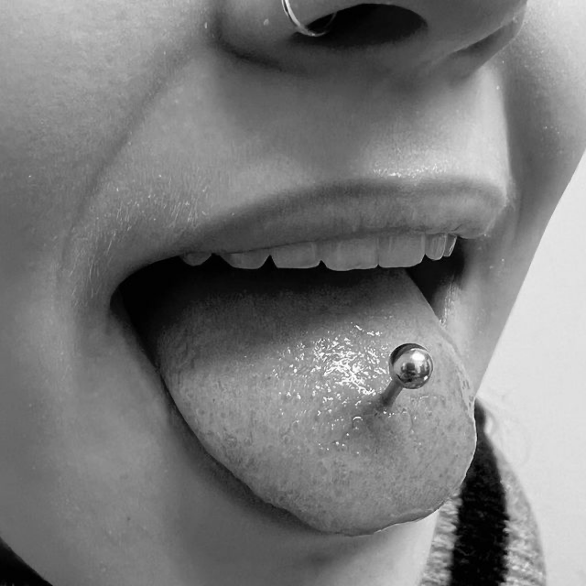 pierced tongue black and white