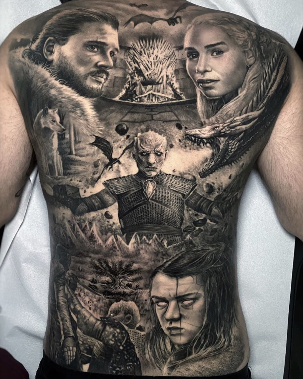 realistic game of thrones back piece tattoo
