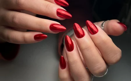red chrome nails on hand