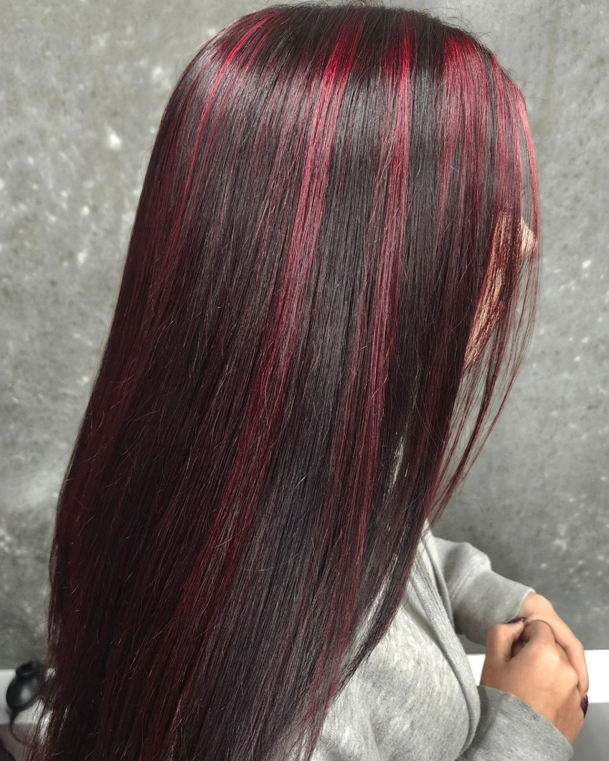 subtle red highlights on darker hair