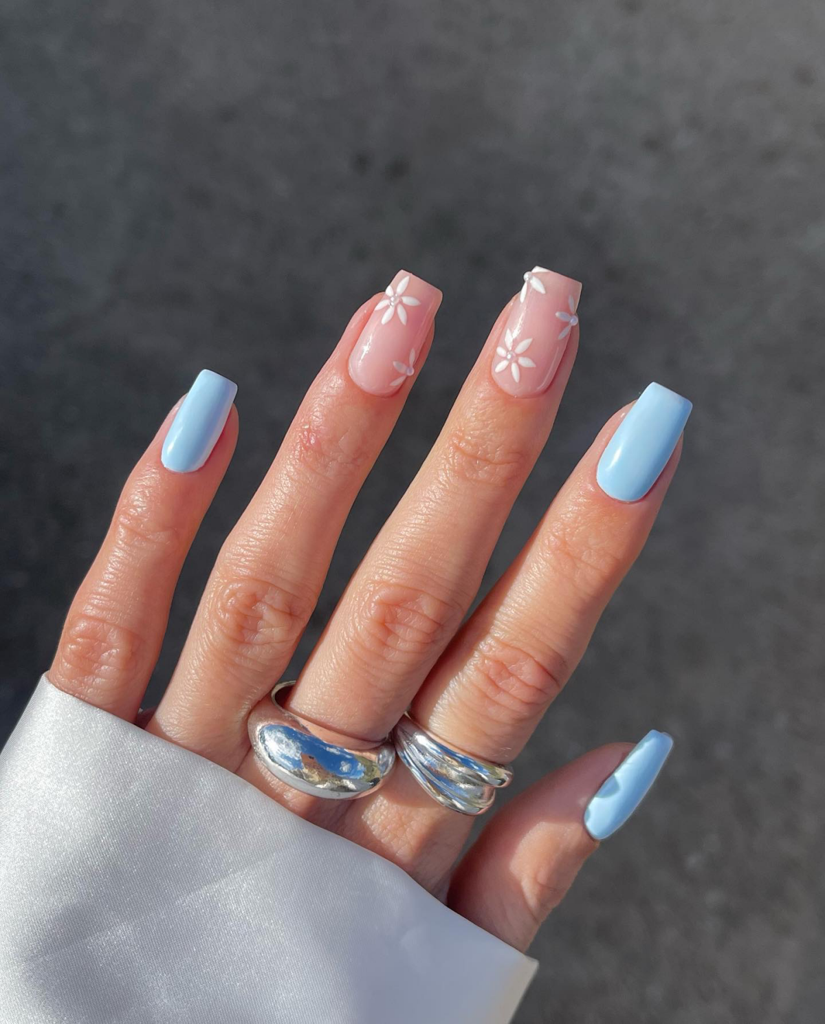 wedding guest nails blue nails with white flowers