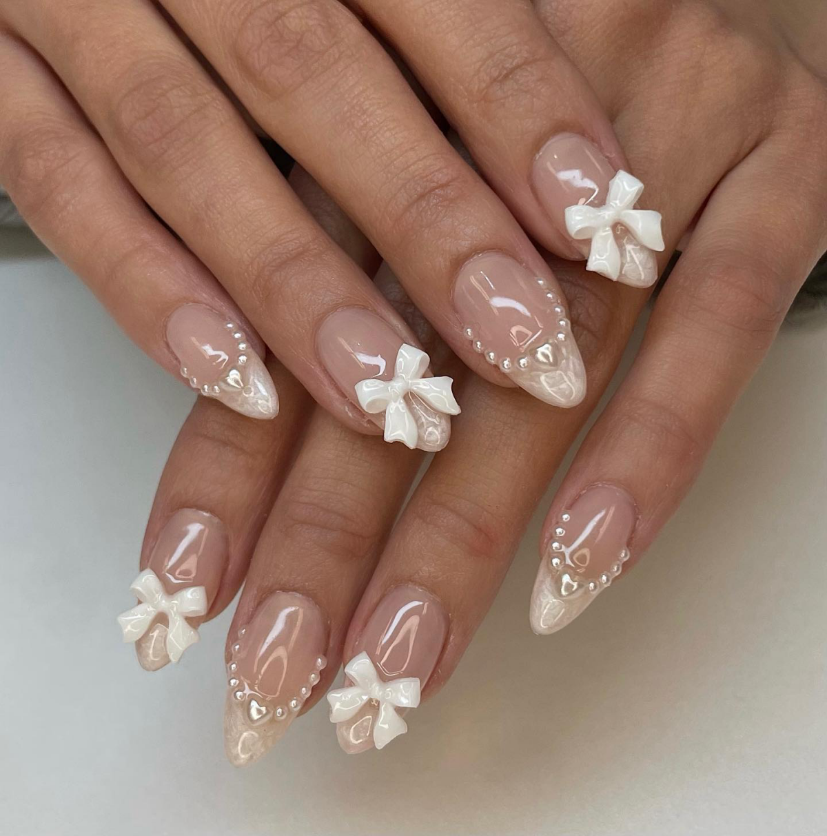 wedding guest nails coquette themed nails