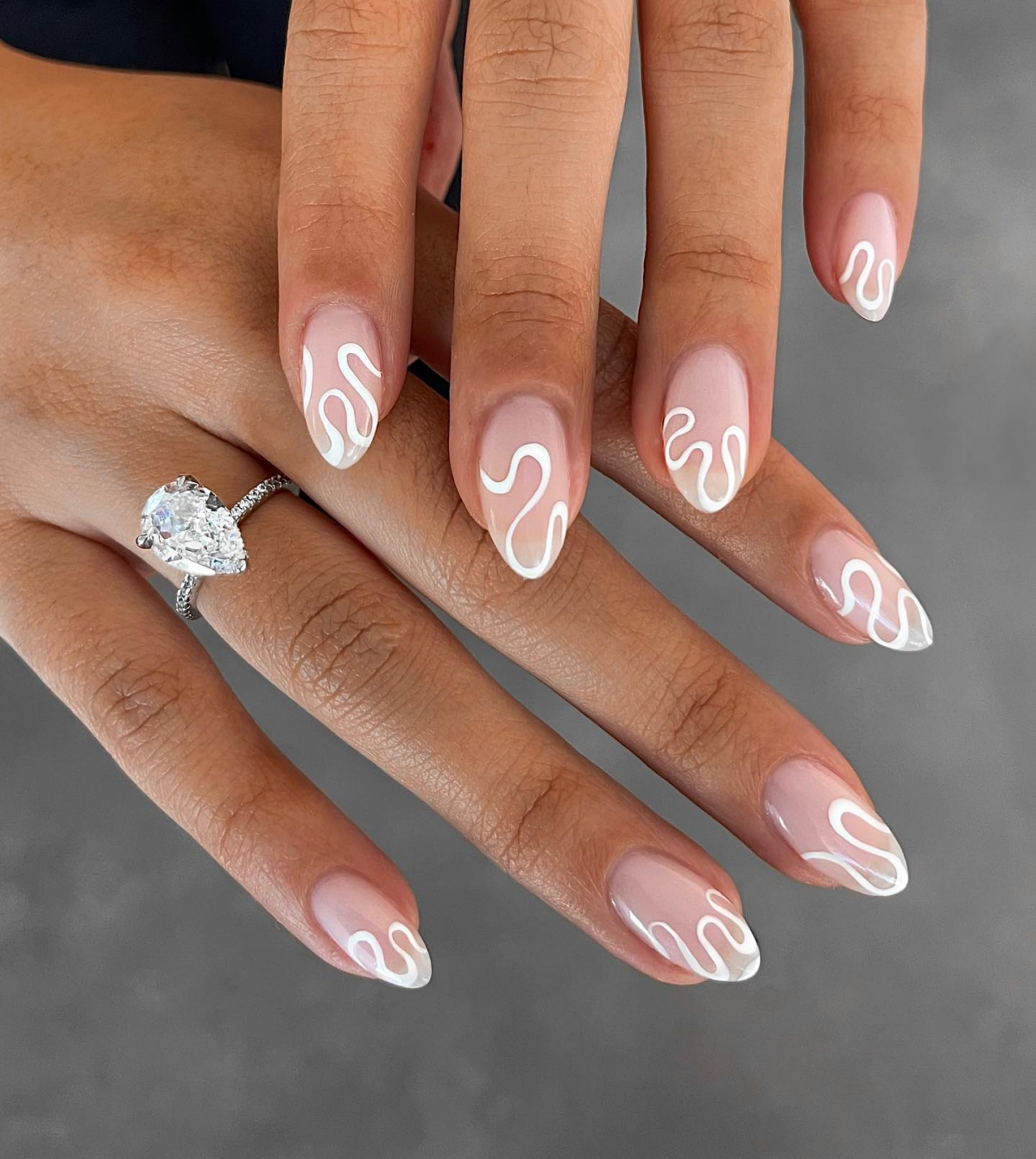 white squiggle tips nail design