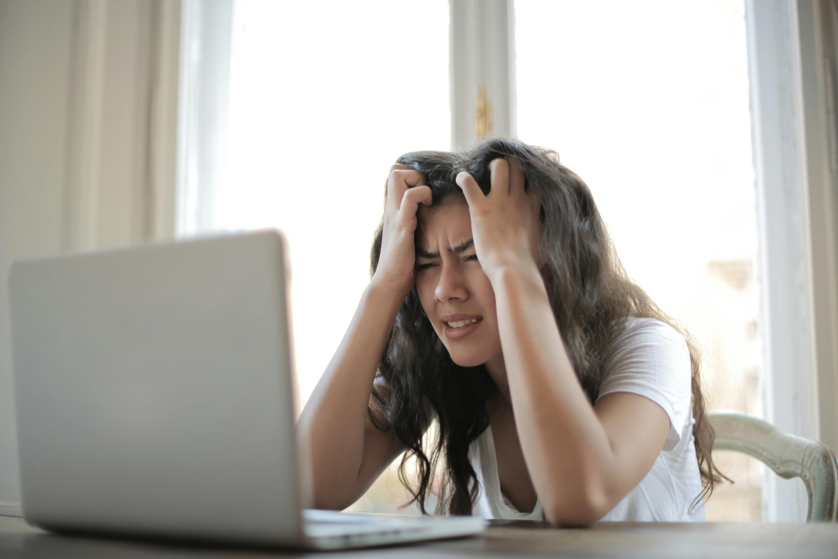 woman stressing in front of computer