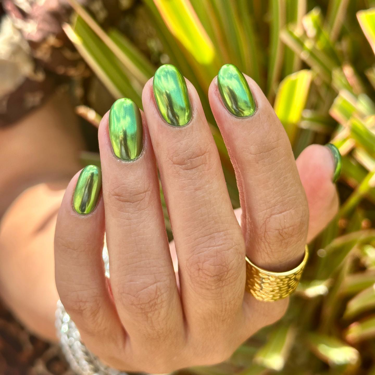 bright chrome nails in green