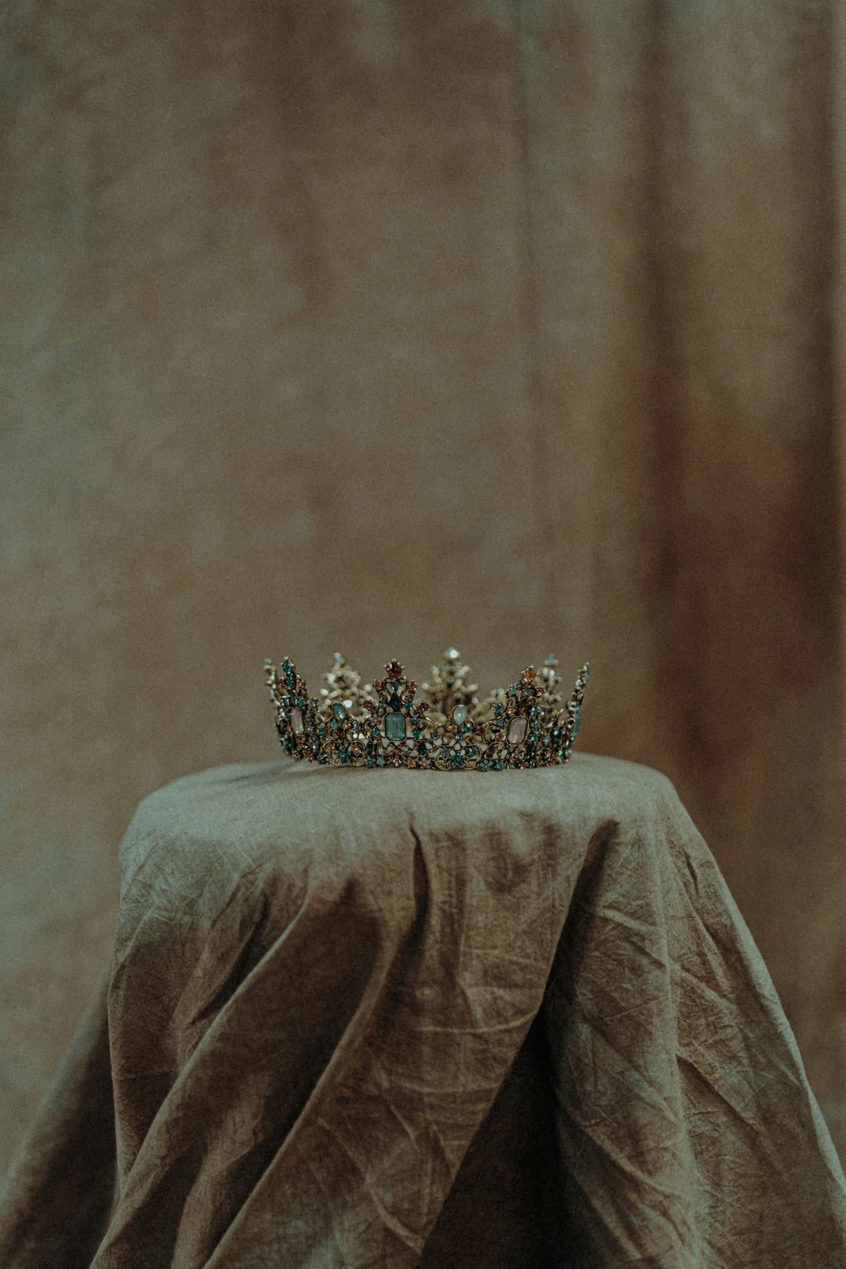 crown on a pediastal
