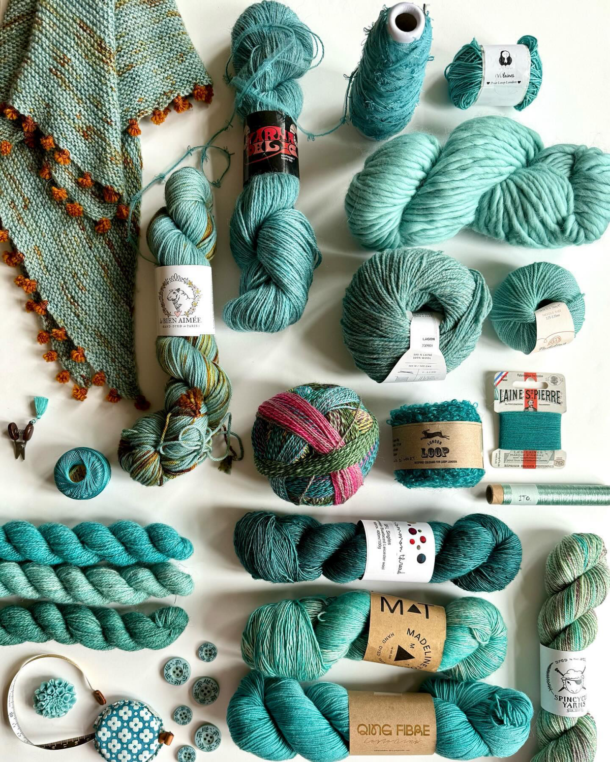 different types of blue and teal yarn