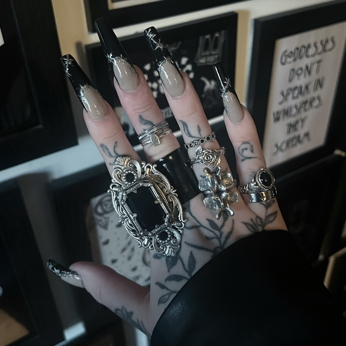 edgy black nail designs black nails with silver chrome and big rings
