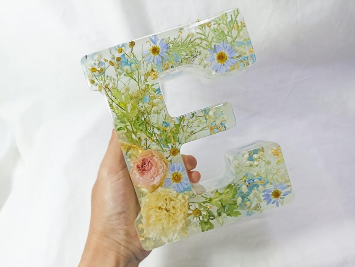 letter with resin flowers in it